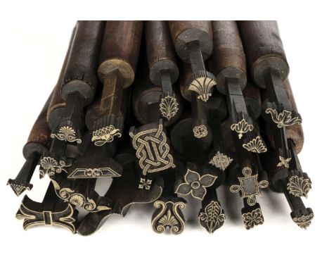 * Decorative finishing tools. 25 brass decorative finishing tools, mostly comprising centre tools, makers include Hicks, Timb