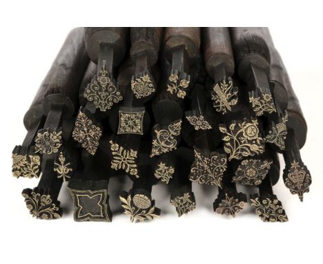 * Decorative finishing tools. 25 brass decorative finishing tools, comprising mostly centre tools, makers include Hicks, and 