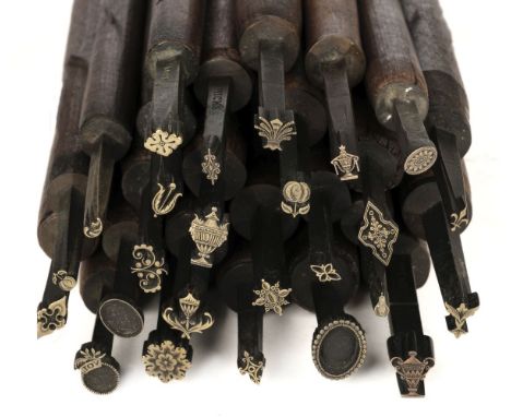 * Decorative finishing tools. 25 brass decorative finishing tools, mostly comprising centre tools, makers include De Lacy, Hi