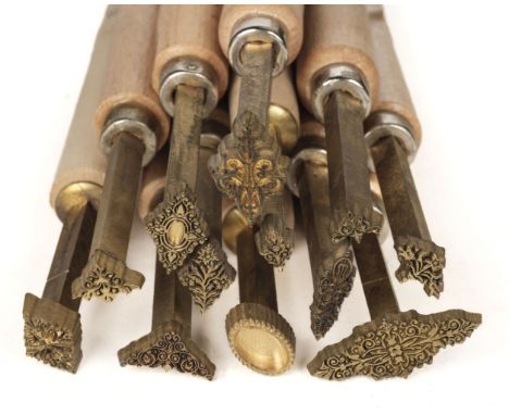 * Decorative finishing tools. 12 brass decorative finishing tools, comprising centre and corner tools, of later 20th century 