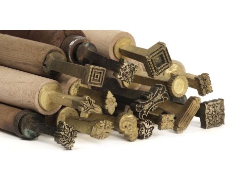 * Decorative finishing tools. A collection of approximately 55 brass decorative finishing tools, comprising mostly centre too