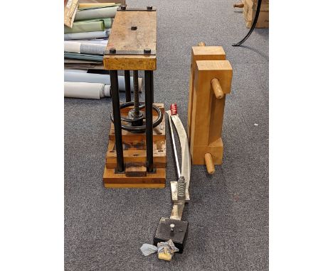* Nipping press. A Dryad nipping press, of wood and metal construction, central screw thread with tightening wheel and metal 