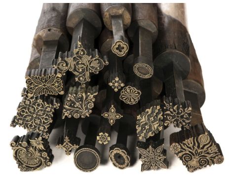 * Decorative finishing tools. 18 brass decorative finishing tools, comprising centre tools, makers include Hicks, Dyer, Brown