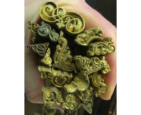 * Decorative finishing tools. A collection of approximately 180 brass decorative finishing tools, comprising centre and corne