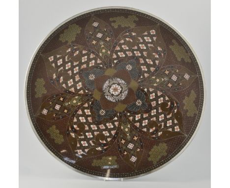 Large Japanese silver wire cloisonné charger, ruby ground, central lotus flower, decorated with stylised butterflies and flow