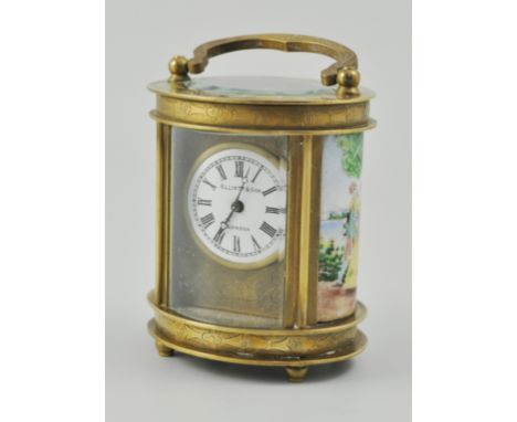 Small French brass-cased carriage clock, of oval section, white enamelled dial, signed - Elliott & Son, London, with panels, 