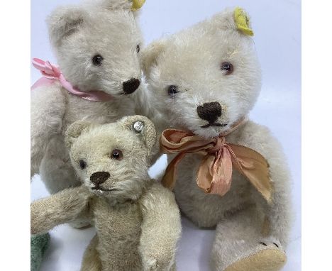 Steiff German antique teddy bears toys , largest 8&rdquo; with buttons in ear 1950s era mid century , with factory bows and a