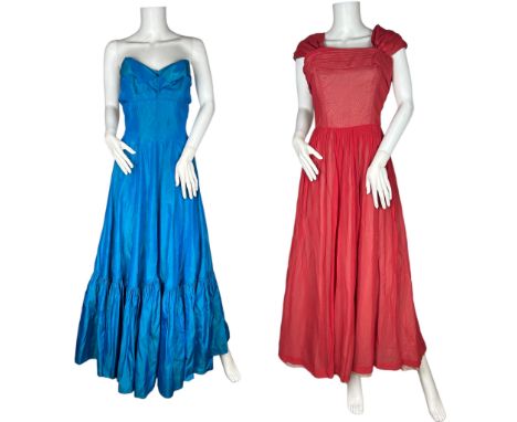 A 1950s evening gown in turquoise shot taffeta with a boned, shelf bodice and full, mermaid hem skirt (30 inch/ 76 cm waist) 