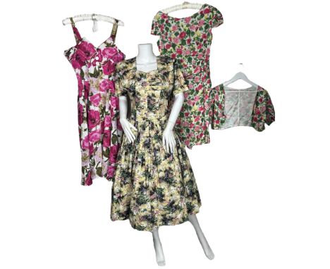 A 1940s/50s sundress with bolero jacket in printed yellow cotton (size tag but no shop label), a 1950s summer dress with huge