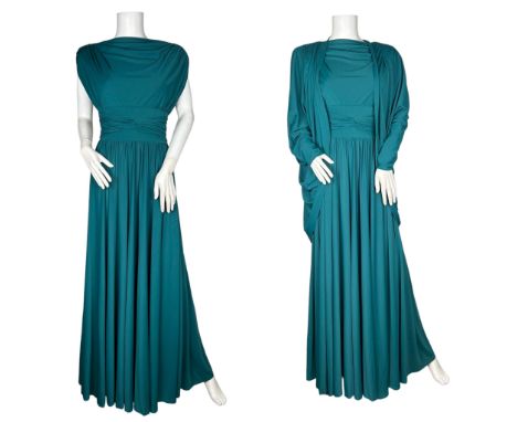 A Horrockses 1970s maxi dress in black jersey with a halter neck and chiffon handkerchief cape with silver binding, a teal gr