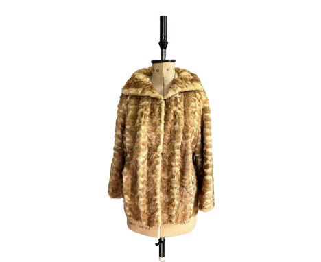 A 1930s/50s mink fur jacket in pastel and pearl with a deep collar and wide cut sleeves. Furrier clips to fasten and set in p
