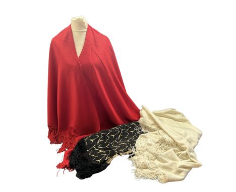 Vintage shawls to include one in an off white wool jersey, half moon style with fringe plus another in red with Guilia Goeth 