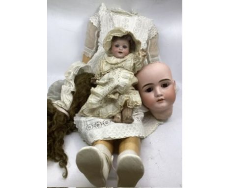 Antique large doll German bisque &nbsp;doll head and body separated and lug is included-which makes in to a large 32&rdquo; d