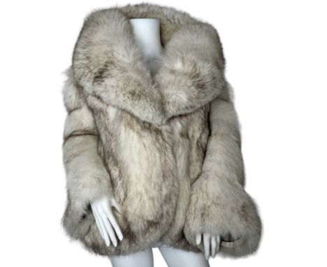 A vintage fox fur jacket with shawl collar, curved front hem and taupe satin lining, the jacket having leather panels at eith