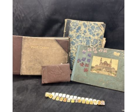 A 19th century scrap book containing cards and scraps from the late 19th and early 20th century, mostly Christmas cards with 
