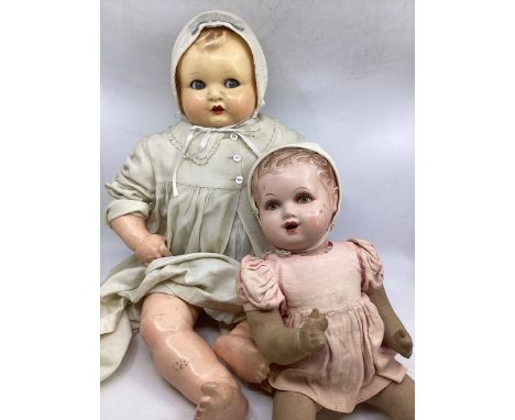 Antique dolls ; to include a composition baby mannequin kind flirty eyed c 22&rdquo; character baby doll with bent limbs and 