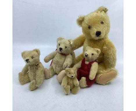 Antique German &nbsp;and vintage Steiff teddy bears in golden mohair , one with small dungarees and largest is 11&rdquo; as a