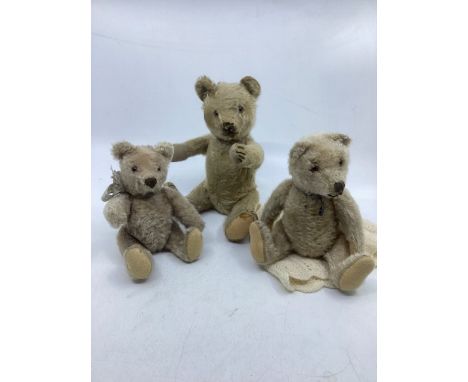 Antique Steiff toys to include 3 bears , one still has a silver brown in ear, light gold mohair , and all with glass original
