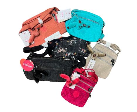 A collection of new with tags Kipling bags to include: two Alvar extra small cross body bags, a Matsuka cross body bag, a Vol