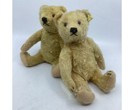 Steiff German mid century 1950s Golden articulated teddy bears , with knitted dress with tags and part cloth label as shown. 