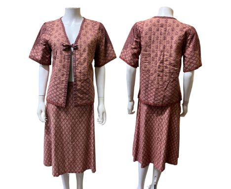 A collection of womens vintage fashions to include a 70s two-piece, three 70s skirts in floral and paisley fabrics and a pair