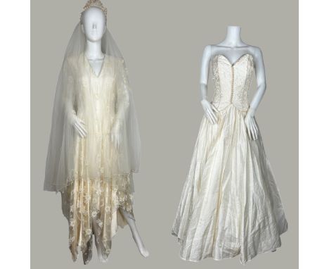 Two vintage wedding dresses to include one mid 1980s in silk dupioni with a full skirt and lace back embroidered bodice with 