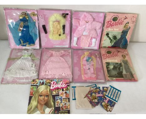 Vintage Barbie doll Original sealed outfits and costumes from around the world and a good Panini barbie 1970s sticker books e