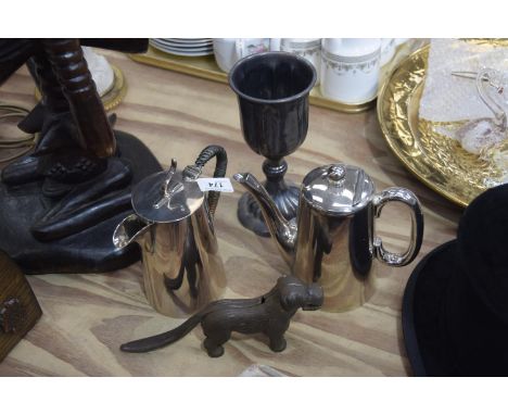 A mixed group of metalware to include a cast iron dog form nutcracker and pewter goblet and two further EPNS teapots by Walke
