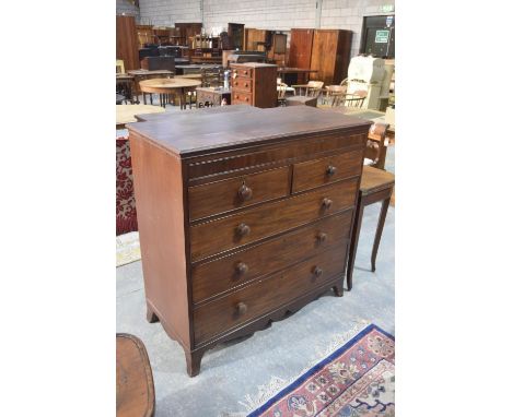 A 19th Century mahogany chest of drawersThe rectangular moulded top above a single secret frieze drawer, two short and three 
