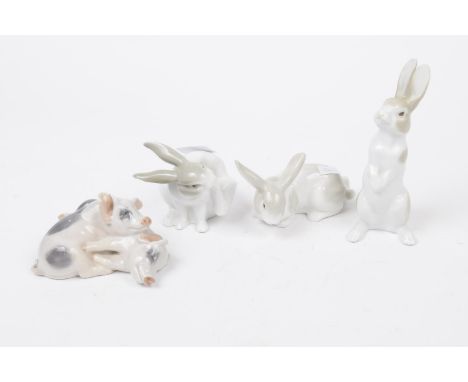 A collection of Royal Copenhagen and Nao figures To include a group of three Nao figures depicting rabbits in various poses t