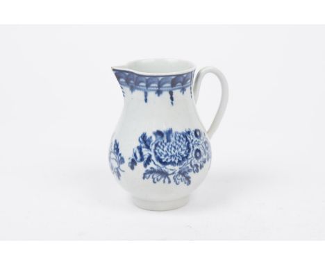 A Worcester blue and white sparrow beak jug, Circa 1770The high tapered foot rim extending to a rounded bulbous body with sho