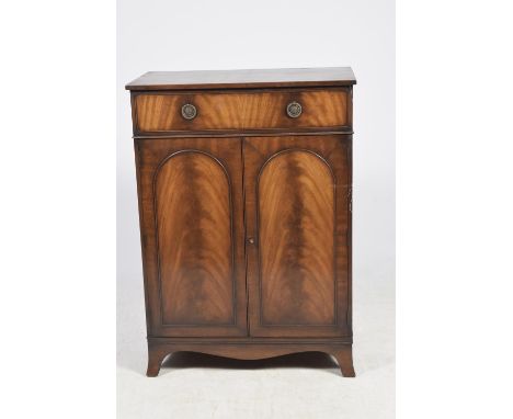 A Georgian style mahogany side cabinet, 20th CenturyWith a single frieze drawer applied with wreath ring handles above a pair