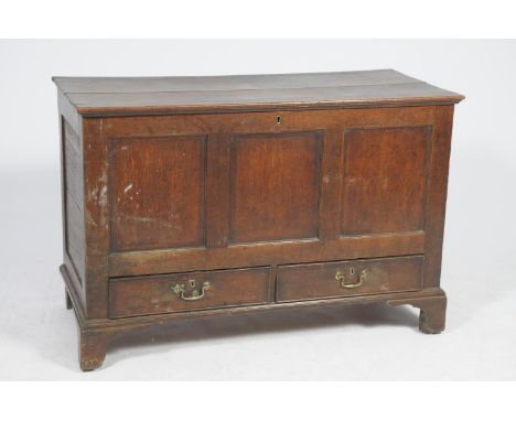 An 18th Century oak mule chest Having three inverted panels above two lower frieze drawers raised upon bracket feet, 118x80x5