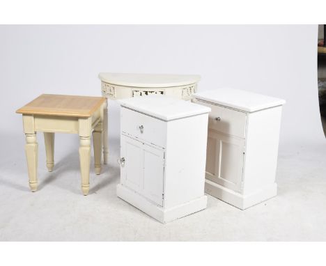 A pair of painted pine bedside cabinetsEach with a single drawer and cupboard door applied with glass knob handles along with