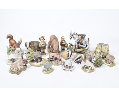 A mixed group of collectible items to include ten various Lilliput Lane cottage figures, a Capo Di Monte style figure group, 