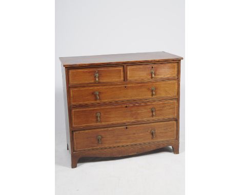 An early 19th Century  mahogany chest of drawersHaving a rectangular top inlaid with stringing above an arrangement of two sh