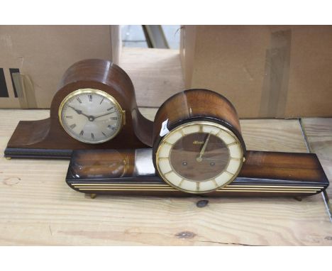 Two 1930's mantle clocksTo include a Napoleon hat mantle clock with silver dial and a Hermle Art Deco mantle clock with two t