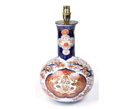 A Japanese Imari bottle vase, late 19th CenturyThe bulbous globe form body extending to a cylindrical neck with slightly spla