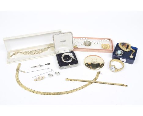 A selection of costume jewelleryTo include a compact, a Citizen watch, brooches, necklaces and scarf clips 