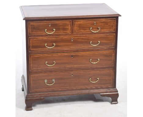 An impressive George III crossbanded mahogany chest of drawersThe rectangular moulded and crossbanded top above an arrangemen