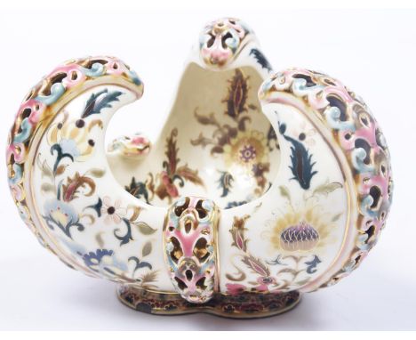 A Zsolnay Pecs centre piece vase, circa 1890 The triform vase extending to scroll upper sections with pierced reticulated pan