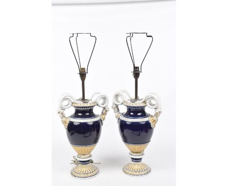 A pair of German Meissen porcelain vases Each of baluster form rising from a gilded splayed base with central knop extending 