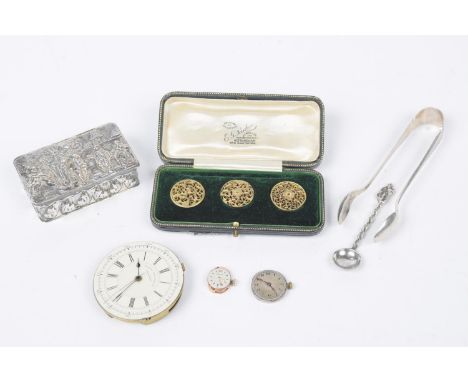 A selection of itemsTo include a silver trinket box, together with a silver spoon and silver sugar nips, three watch movement