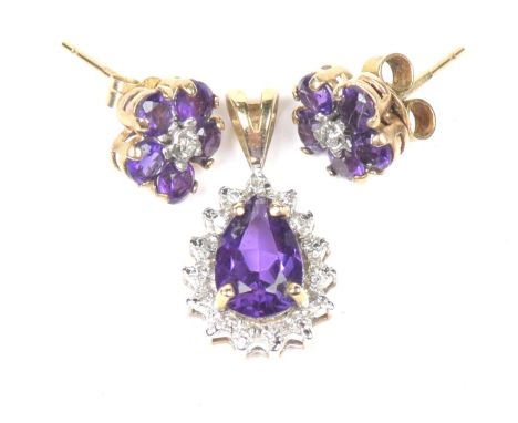 A 9ct gold amethyst and diamond cluster pendantDesigned as a pear shape amethyst within a single cut diamond surround, togeth