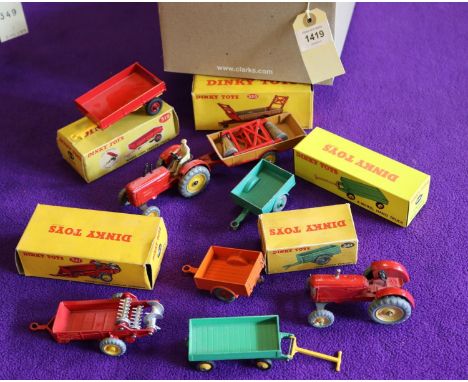 Dinky Toys Farm Related items. 2x Massey-Harris Tractor (300), both in red with metal wheels with yellow centres. One driver 