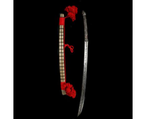 A Burmese sword dha. c.1900, curved SE blade 63cms slightly swollen towards the tip and entirely covered on both sides with s