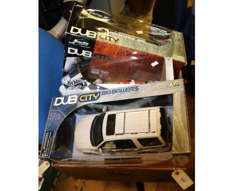 4 1:18 scale vehicles. 3x Dub City Big Ballers - GMC Yukon Denali in black. Lincoln Navigator in metallic white with silver f