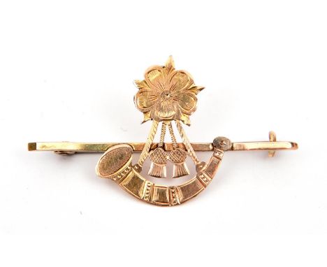 A 9 ct gold sweetheart tie pin of the 6th Bn The King's (Liverpool Regt),  a bugle surmounted by the Rose of Lancaster. GC 