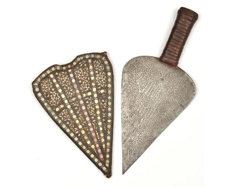 A Sudanese trowel-shaped dagger. first half of the 20th century, blade 23cms etched overall with inscriptions in thuluth, lea