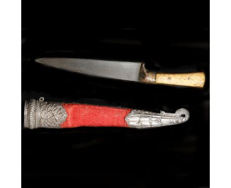 An Indian dagger kard. Probably Kutch second half of the 19th century, broad straight SE wootz blade 15.5cms, 2 piece bone gr